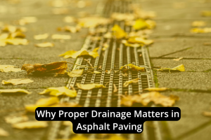 Metal drainage grate on asphalt pavement with scattered yellow leaves, accompanied by the text "Why Proper Drainage in Asphalt Paving Matters.